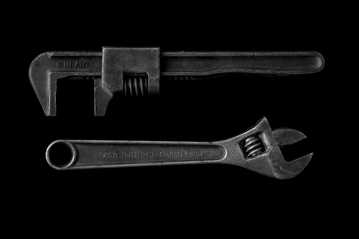 Adjustable wrench and pipe wrench used for plumbing repairs