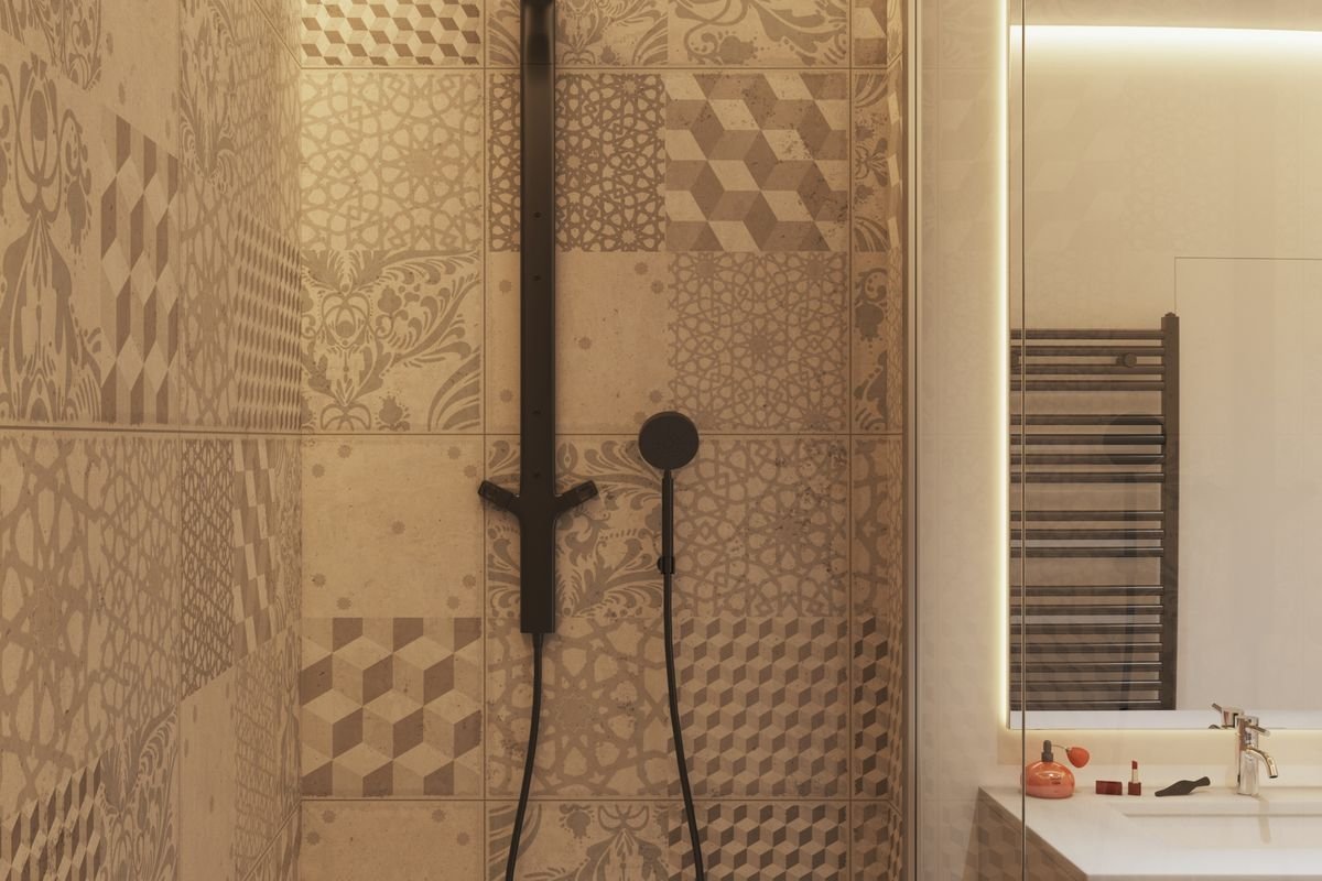 Bathroom with patterned tiles and shower head
