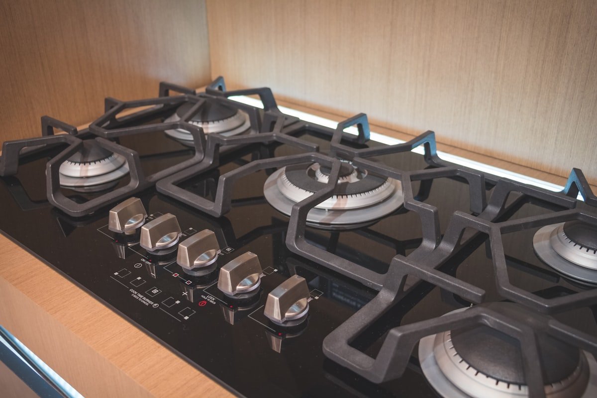 Black and silver gas hob appliance