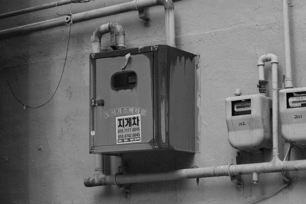 Gas meters and pipework fitted on a wall