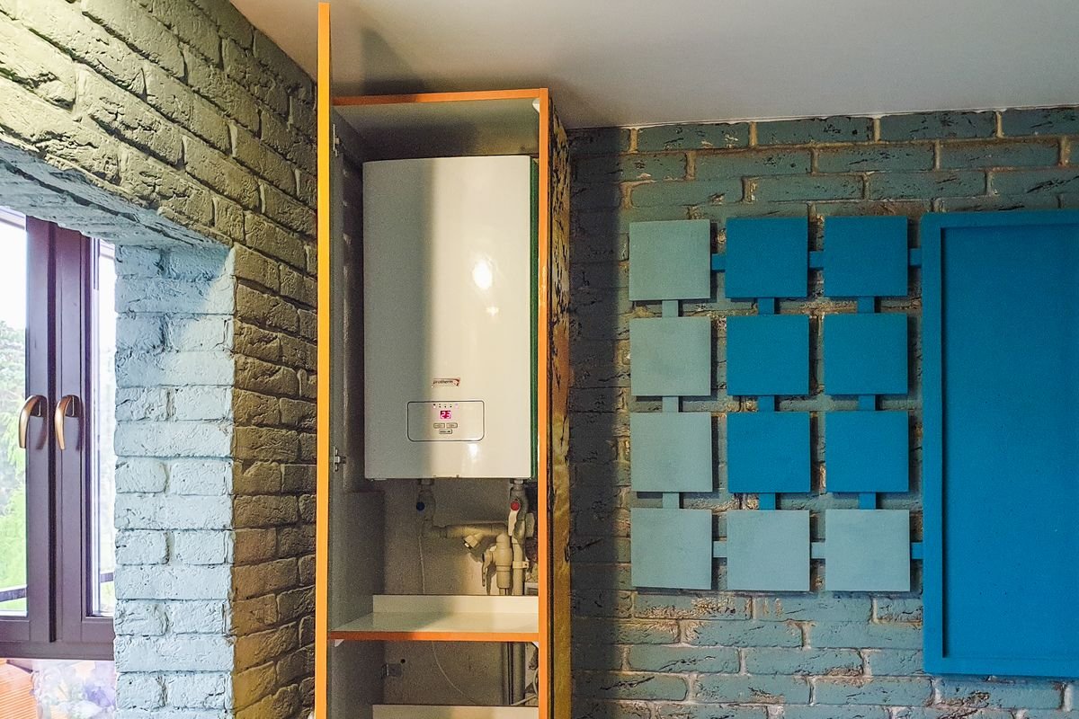 Water heater installed in a cabinet