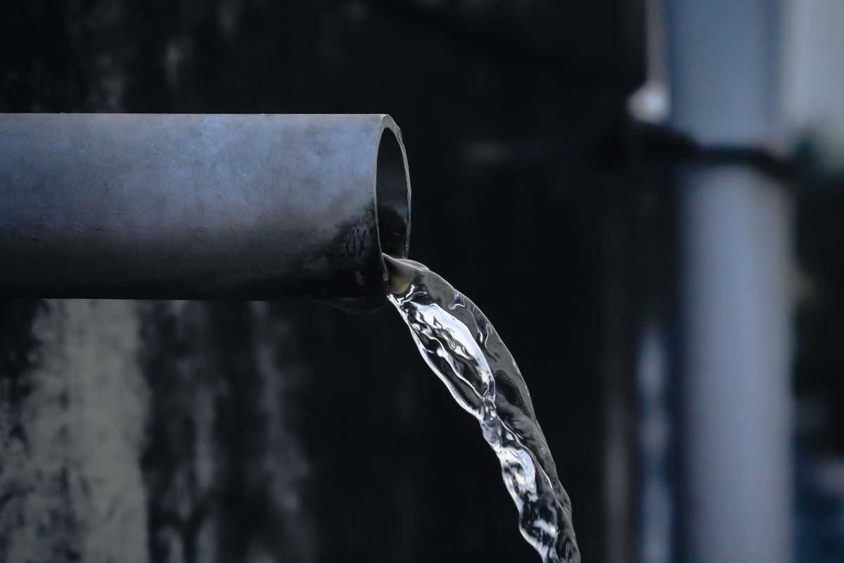 Water flowing from a metal pipe