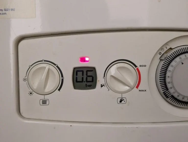 Boiler pressure gauge showing low pressure in a UK home